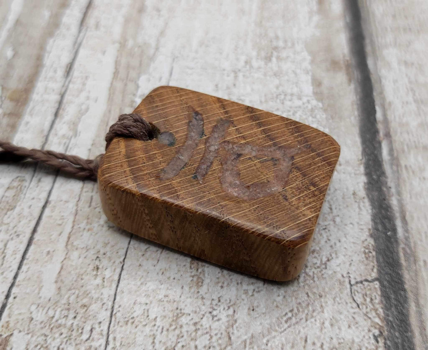 Oak wood sacral chakra and sunstone inlay.