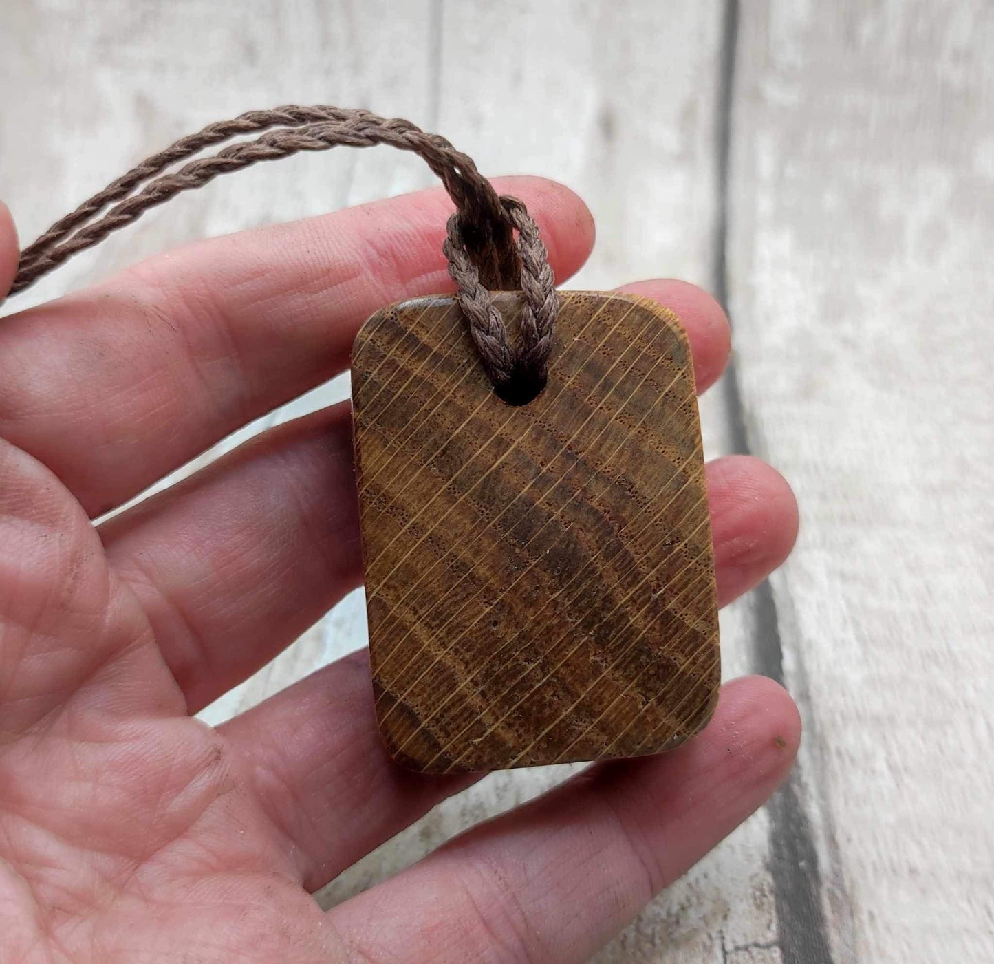 Oak wood gebo rune Christmas decoration with Pāua shell.