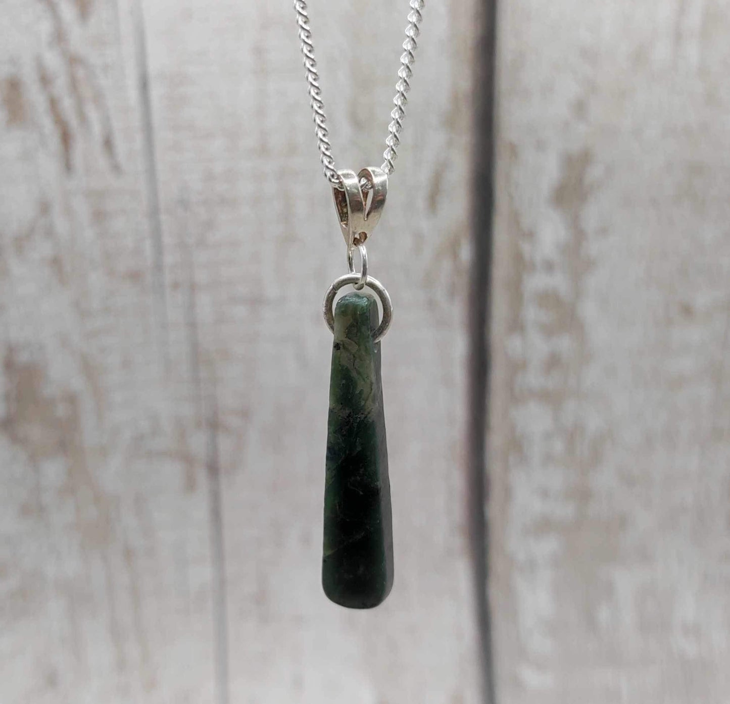 New Zealand Pounamu Greenstone serpentine, roimata drop on silver pendant.