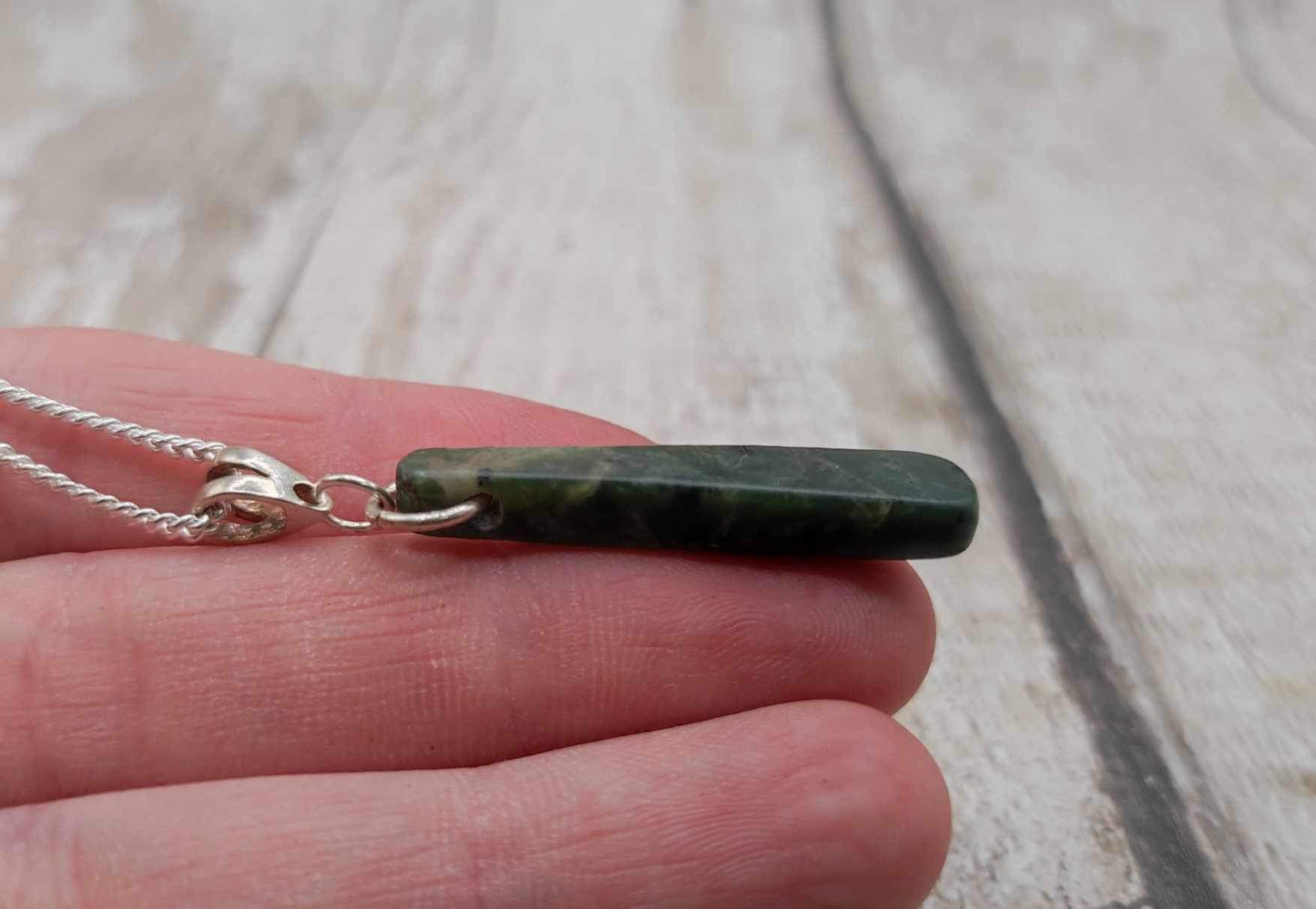 New Zealand Pounamu Greenstone serpentine, roimata drop on silver pendant.