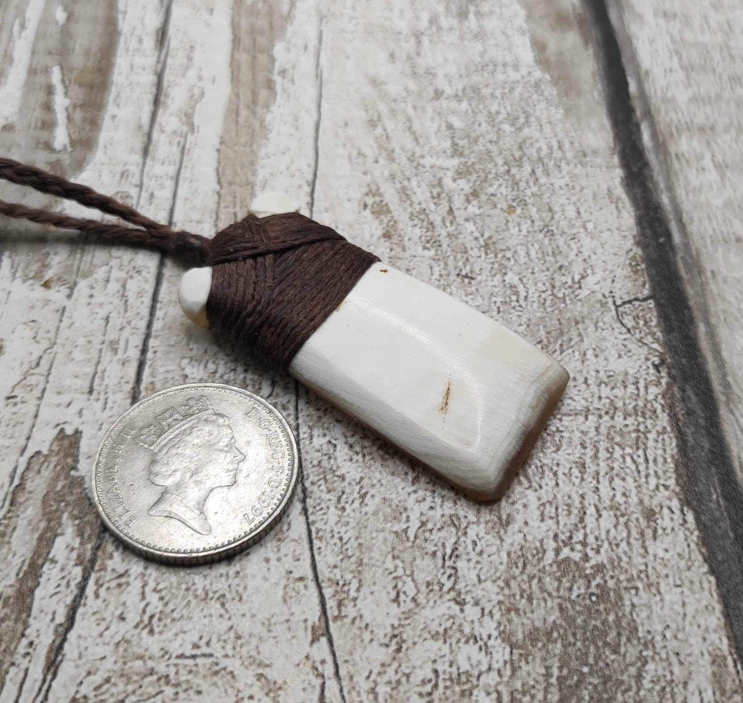 Cow horn Hei Toki adze unisex pendant.