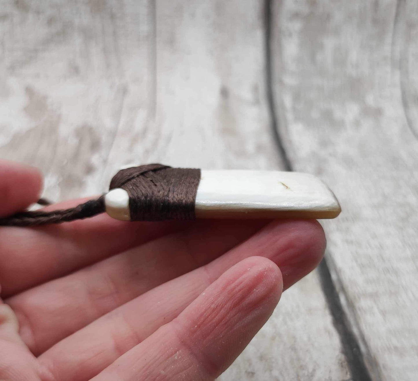 Cow horn Hei Toki adze unisex pendant.