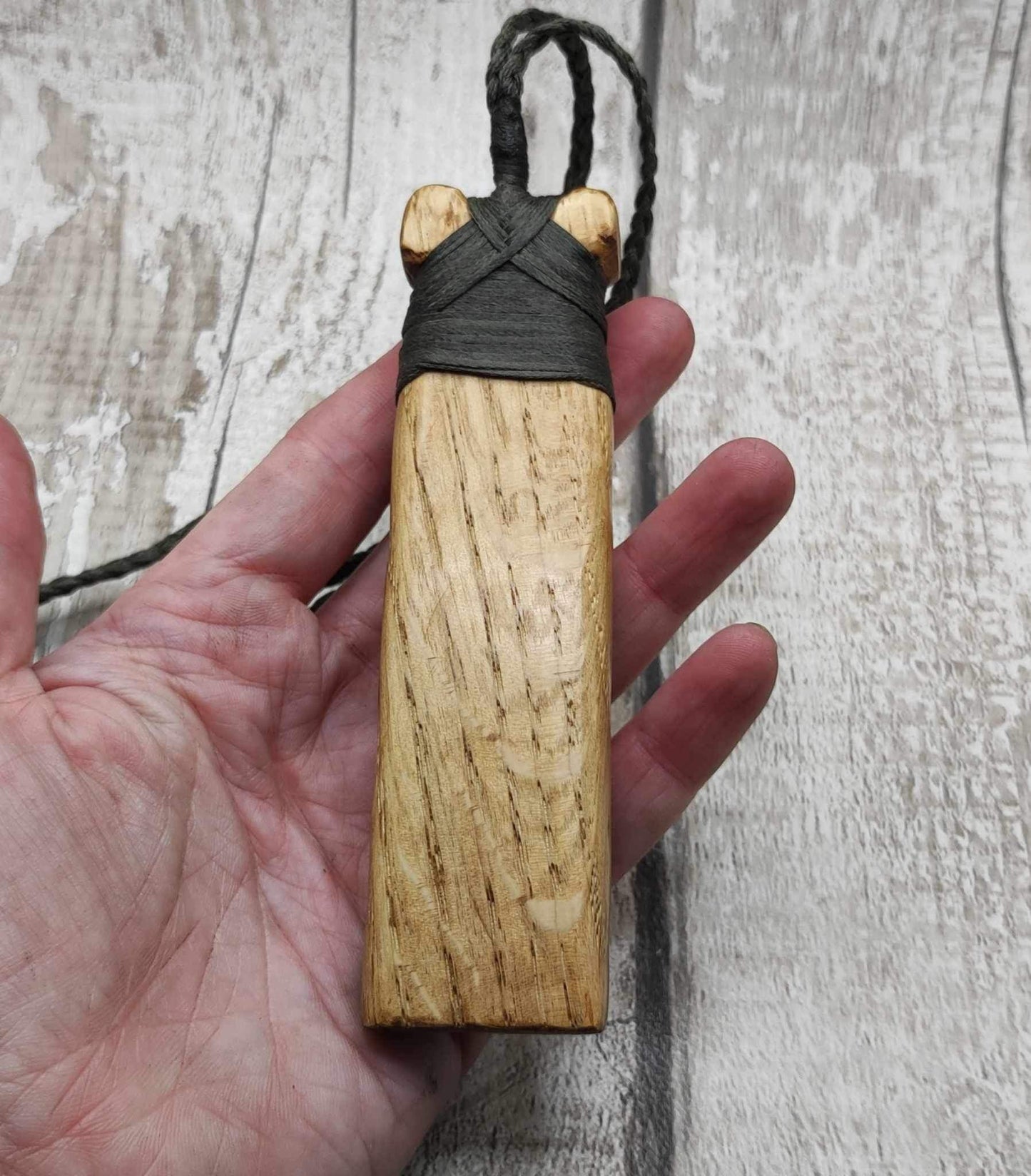 Oak wood statement Hei Toki adze pendant with blue kyanite inlay.