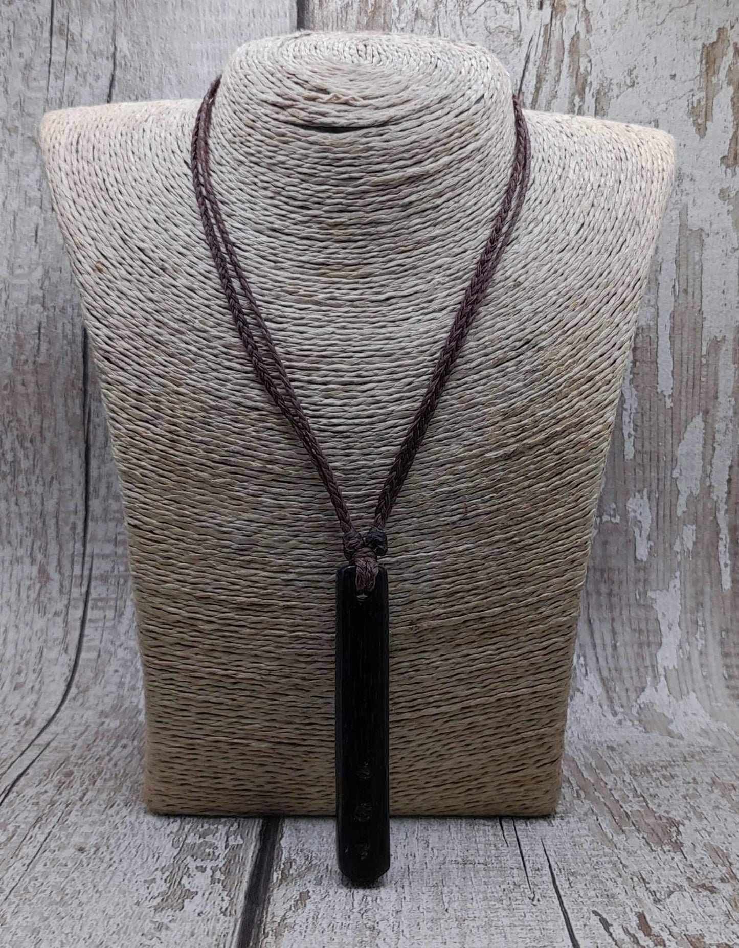 Bog oak + moldavite roimata carved pendant.