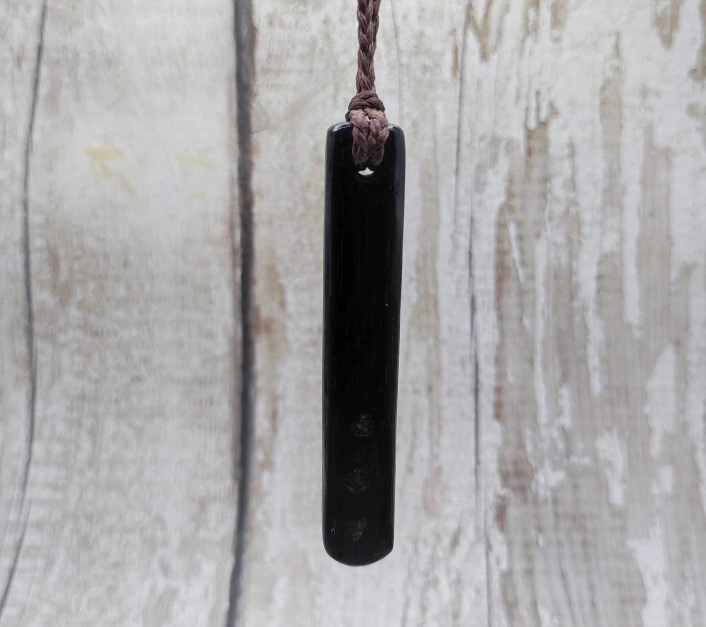 Bog oak + moldavite roimata carved pendant.