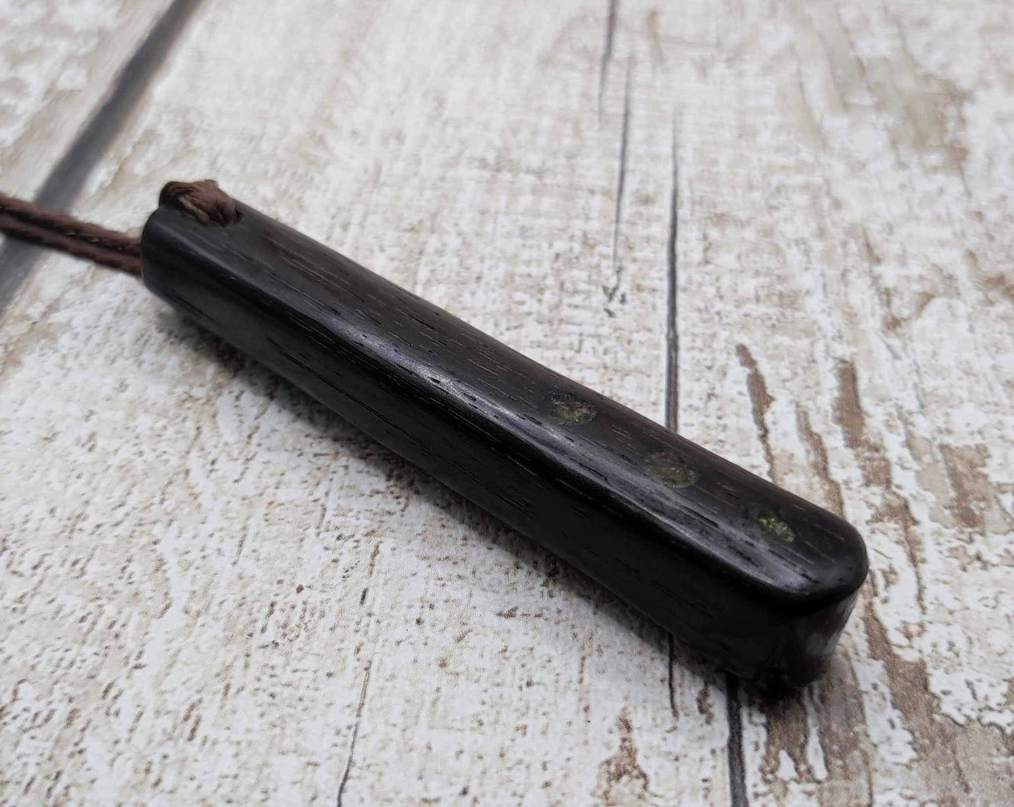 Bog oak + moldavite roimata carved pendant.