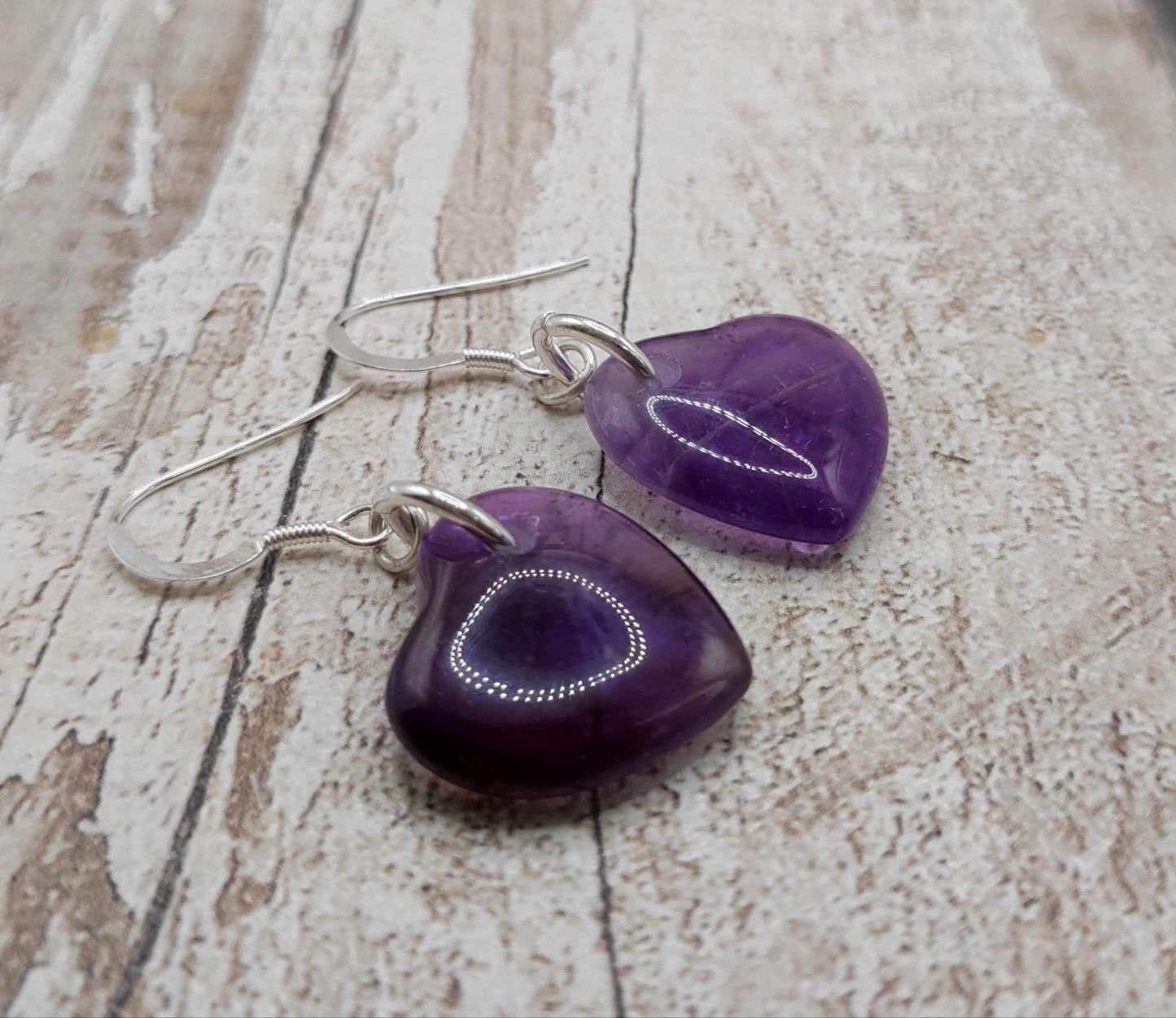Amethyst heart shapes earrings.