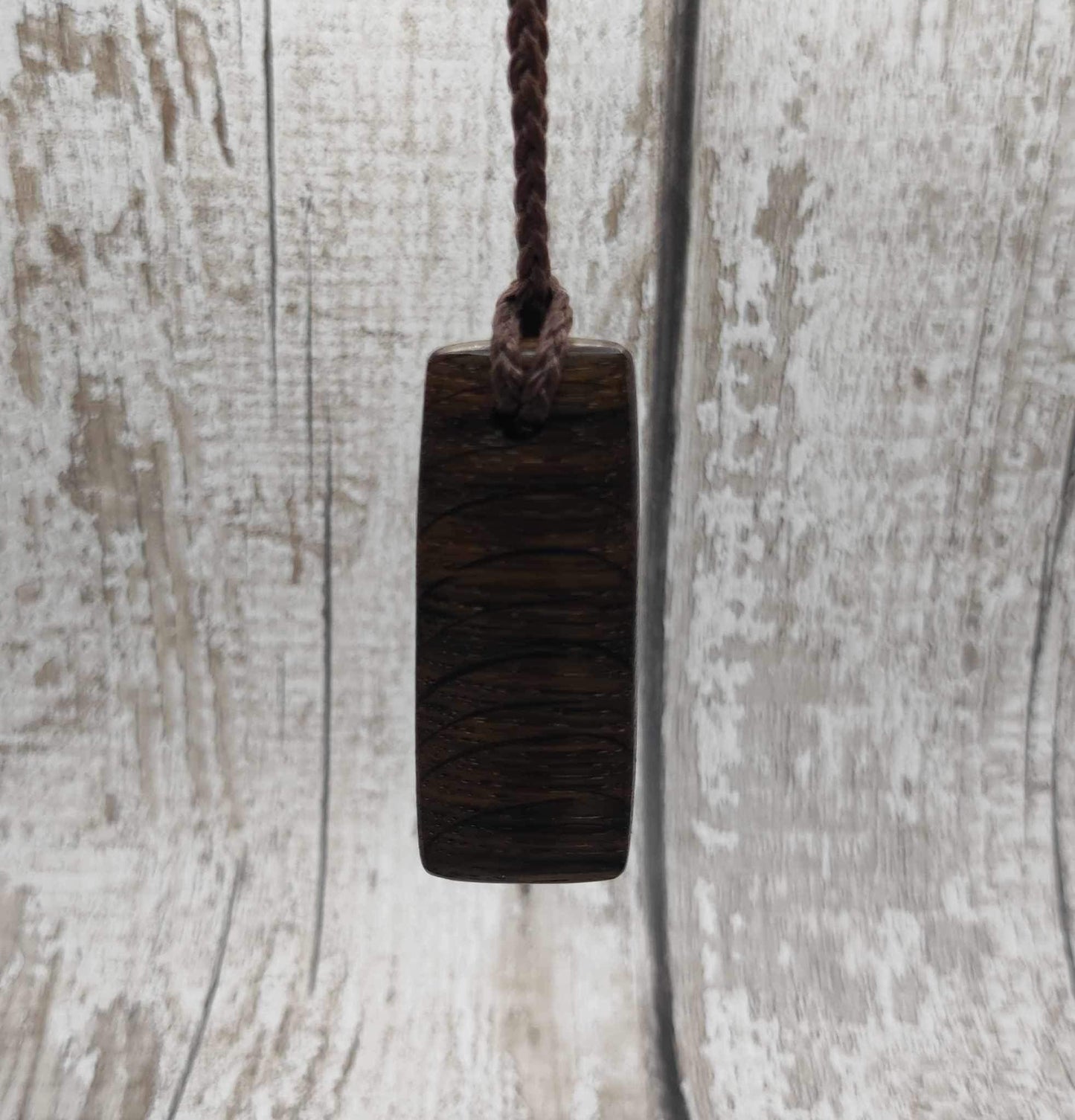 Bog preserved oak Hei Toki adze pendant with kanite inlay.