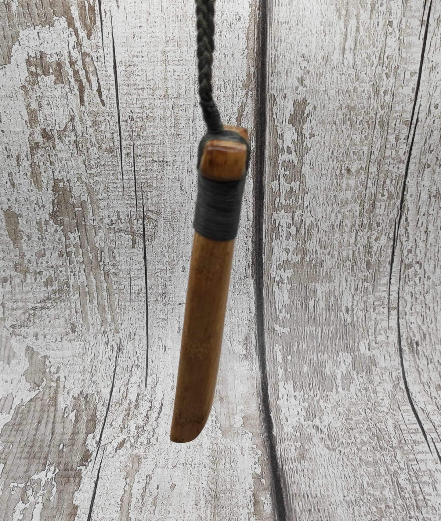 Oak wood statement Hei Toki adze pendant with blue kyanite inlay.