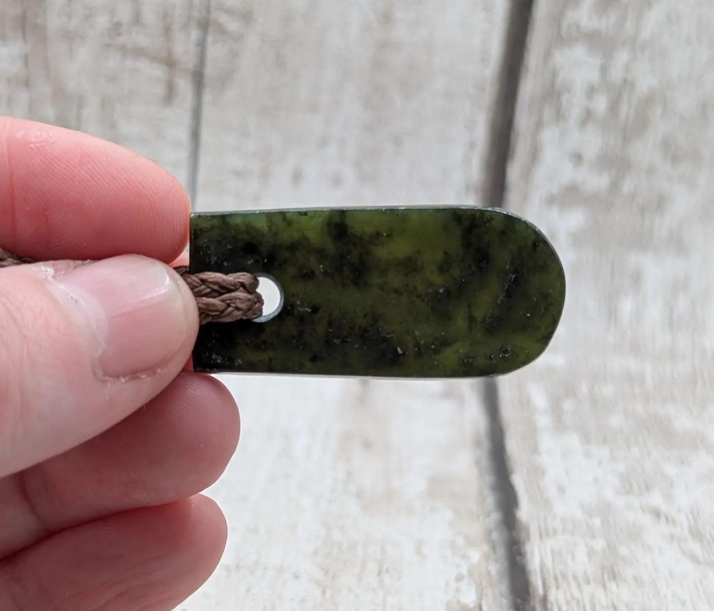 New Zealand Pounamu greenstone roimata drop pendant.