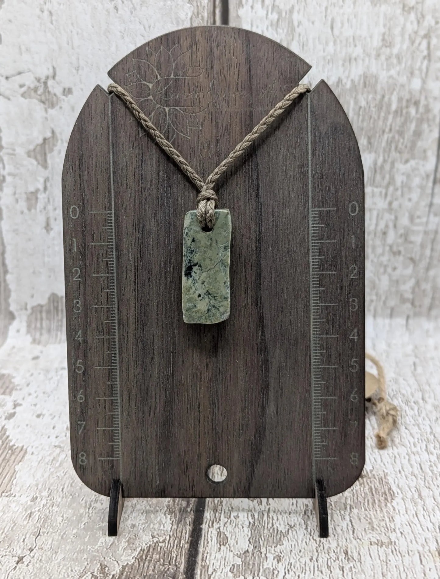 New Zealand pounamu greenstone jade slice with raw back.