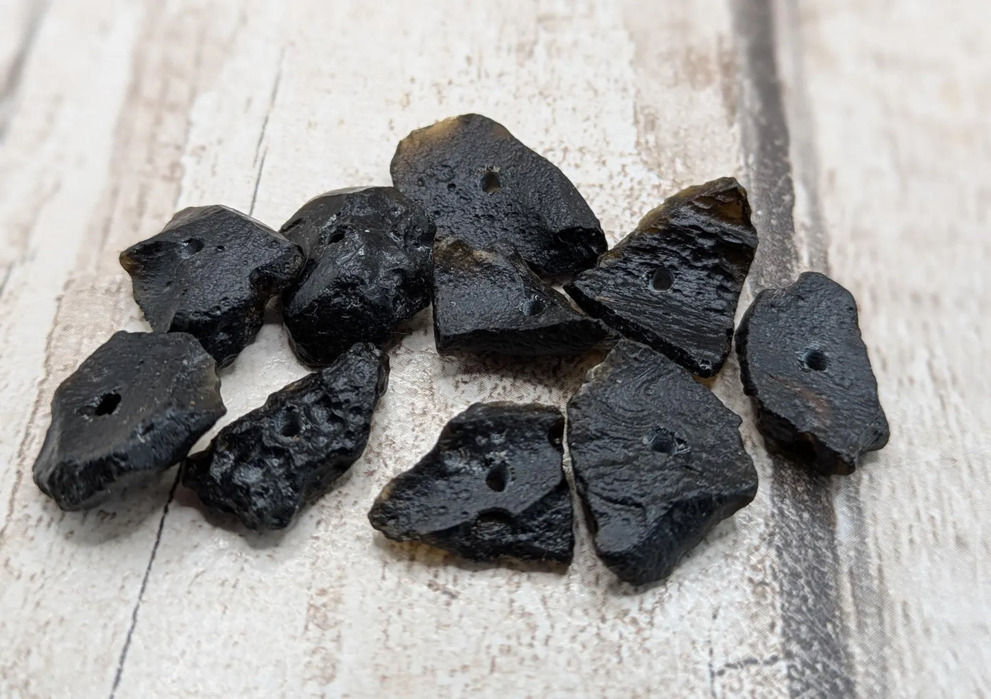 10 Indonesian tektite glass beads.