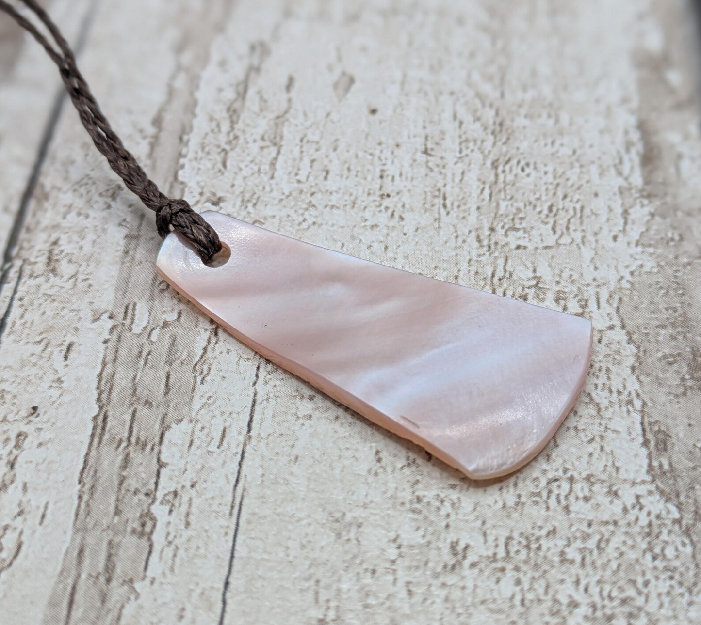 NZ Pink Freshwater Mussel Shell Roimata Trapezoid Pendant – Carved Teardrop with Pearlescent & Natural Shell Sides.