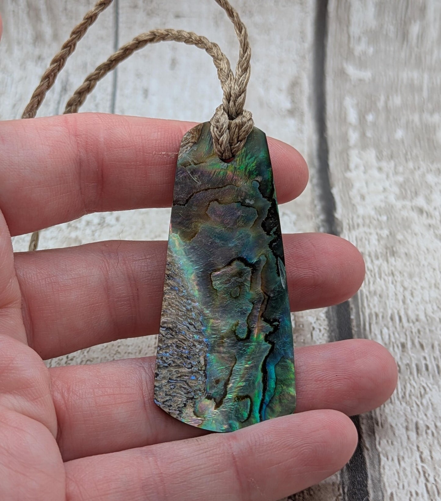 New Zealand Rainbow pāua shell pendant - iridescent abalone necklace, trapezoid shape, oceanic gift, hand crafted jewellery.
