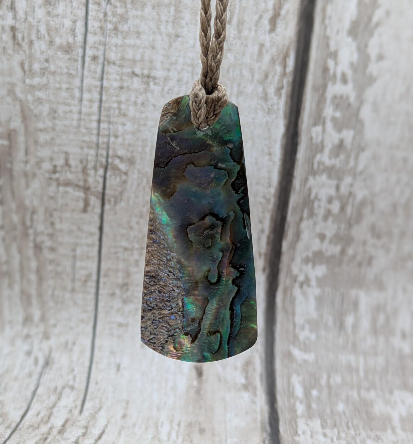 New Zealand Rainbow pāua shell pendant - iridescent abalone necklace, trapezoid shape, oceanic gift, hand crafted jewellery.