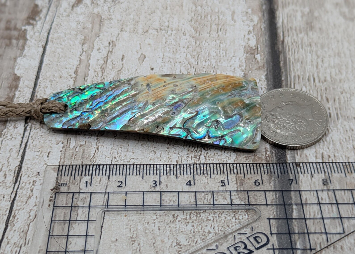 New Zealand Rainbow pāua shell pendant - iridescent abalone necklace, trapezoid shape, oceanic gift, hand crafted jewellery.