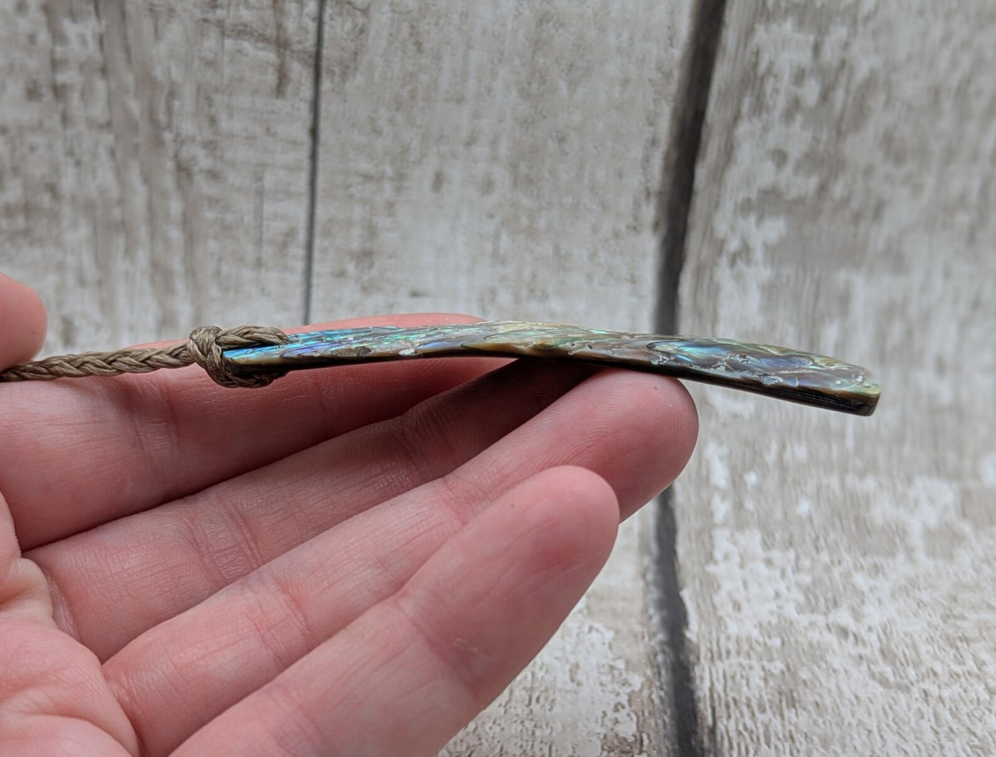 New Zealand Rainbow pāua shell pendant - iridescent abalone necklace, trapezoid shape, oceanic gift, hand crafted jewellery.