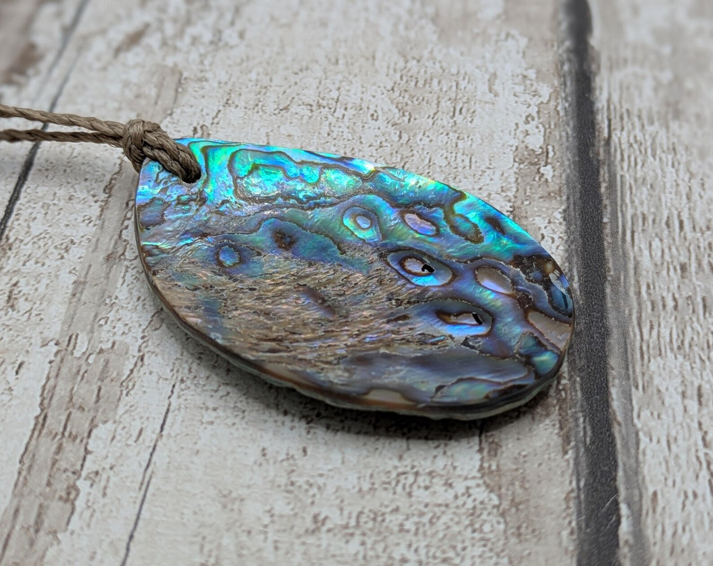 New Zealand rainbow pāua large year drop statement pendant, ocean themed, natural statement amulet.