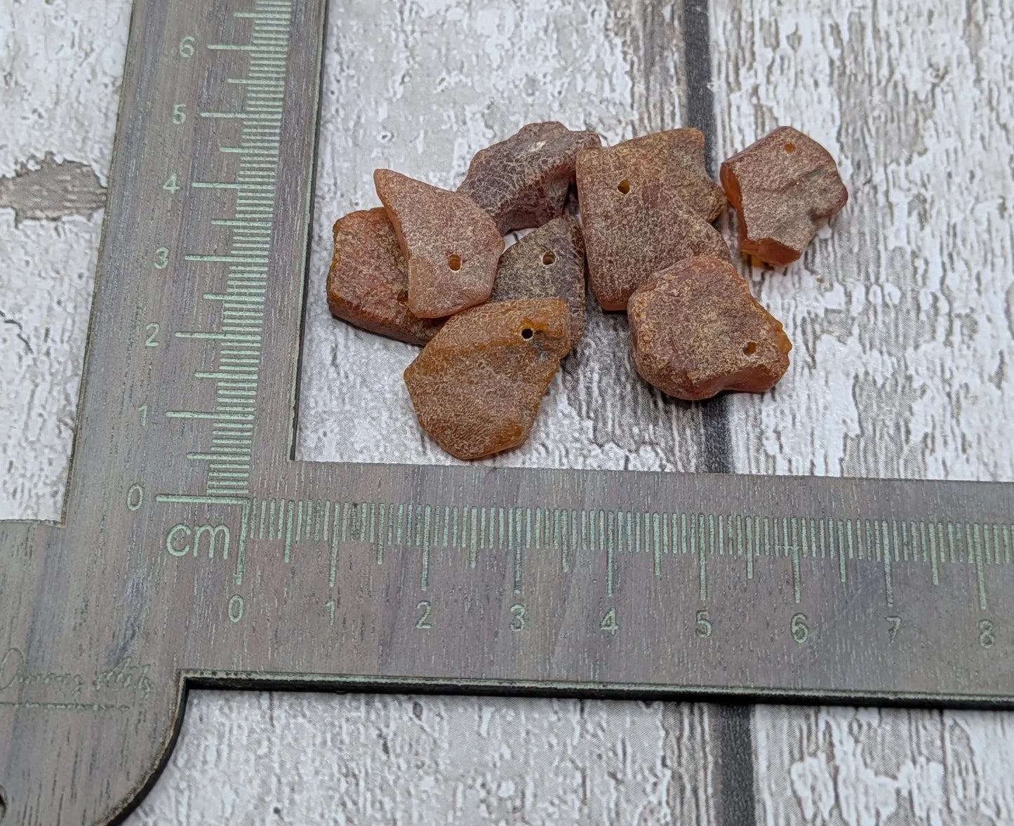 Raw natural top drilled Baltic Amber beads.