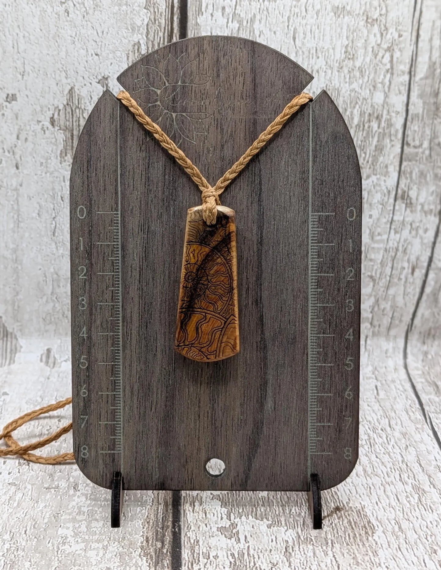 Yew wood laser printed all over ammonite print pendant.