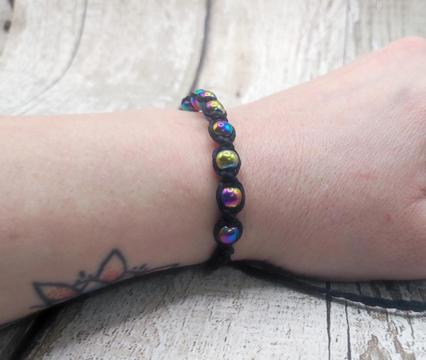 Titanium plated Magnetic hematite adjustable macramè bracelet.