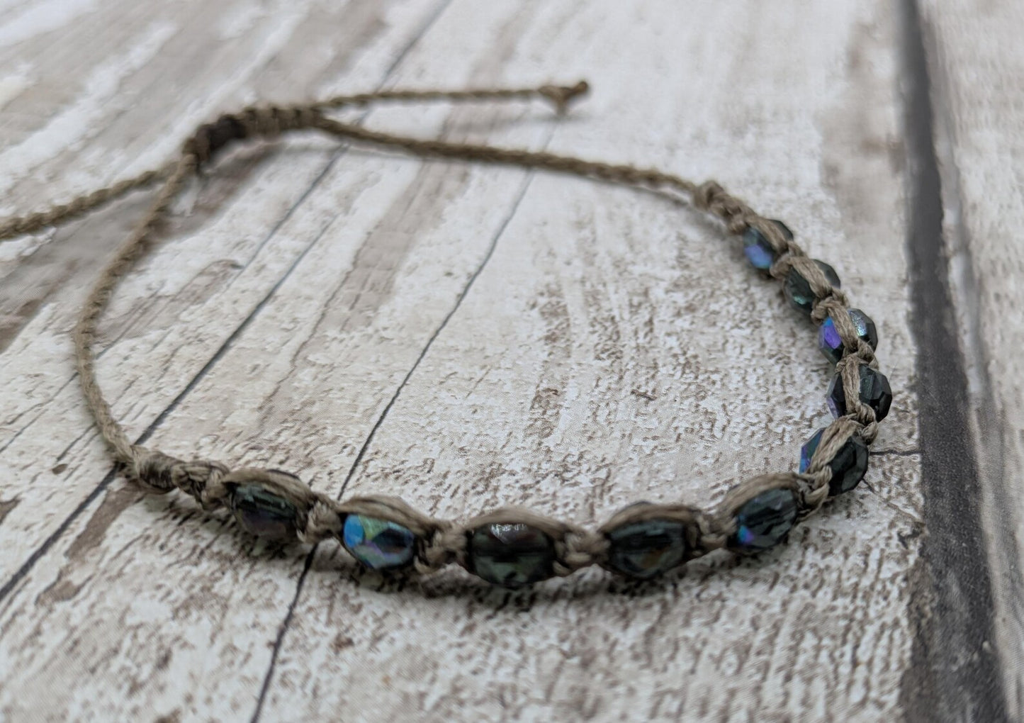 Glass bead macrame woven adjustable bracelet.