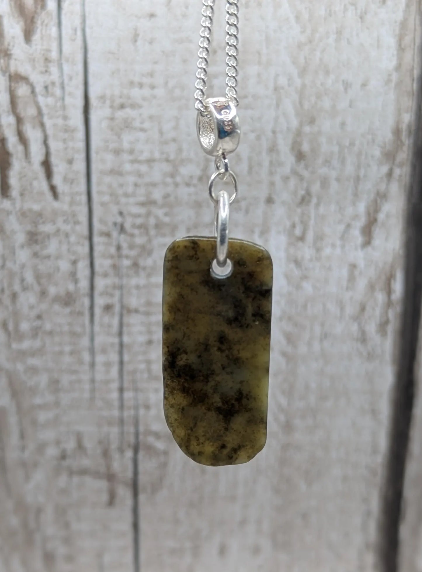 New Zealand Pounamu Jade Pendant on Sterling Silver Chain – Tumbled polished Greenstone Necklace, spiritual talisman, cultural amulet.