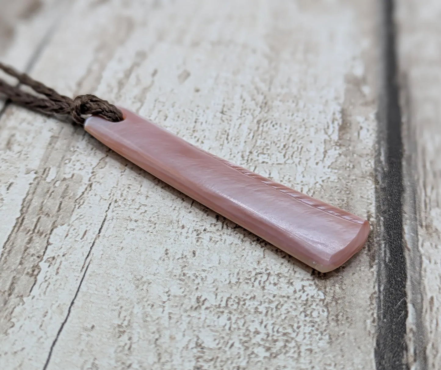 New Zealand pink freshwater mussel shell roimata pendant.