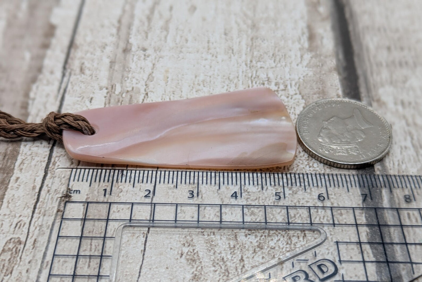 New Zealand Fresh water pink mussel shell roimata styled pendant.