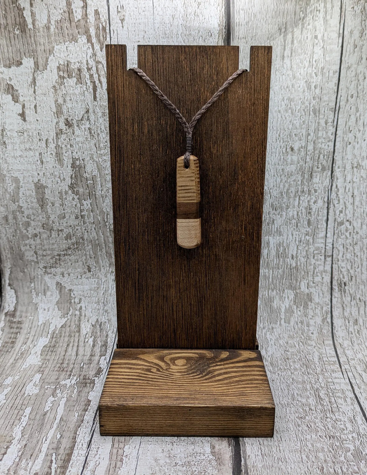 mixed wood roimata teardrop pendant.