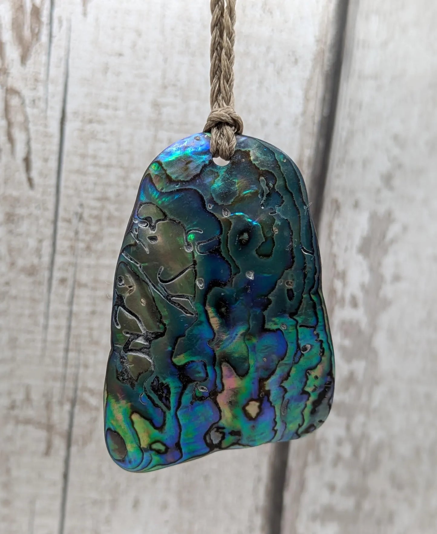 Wild New Zealand beach combed free form rainbow Pāua pendant
