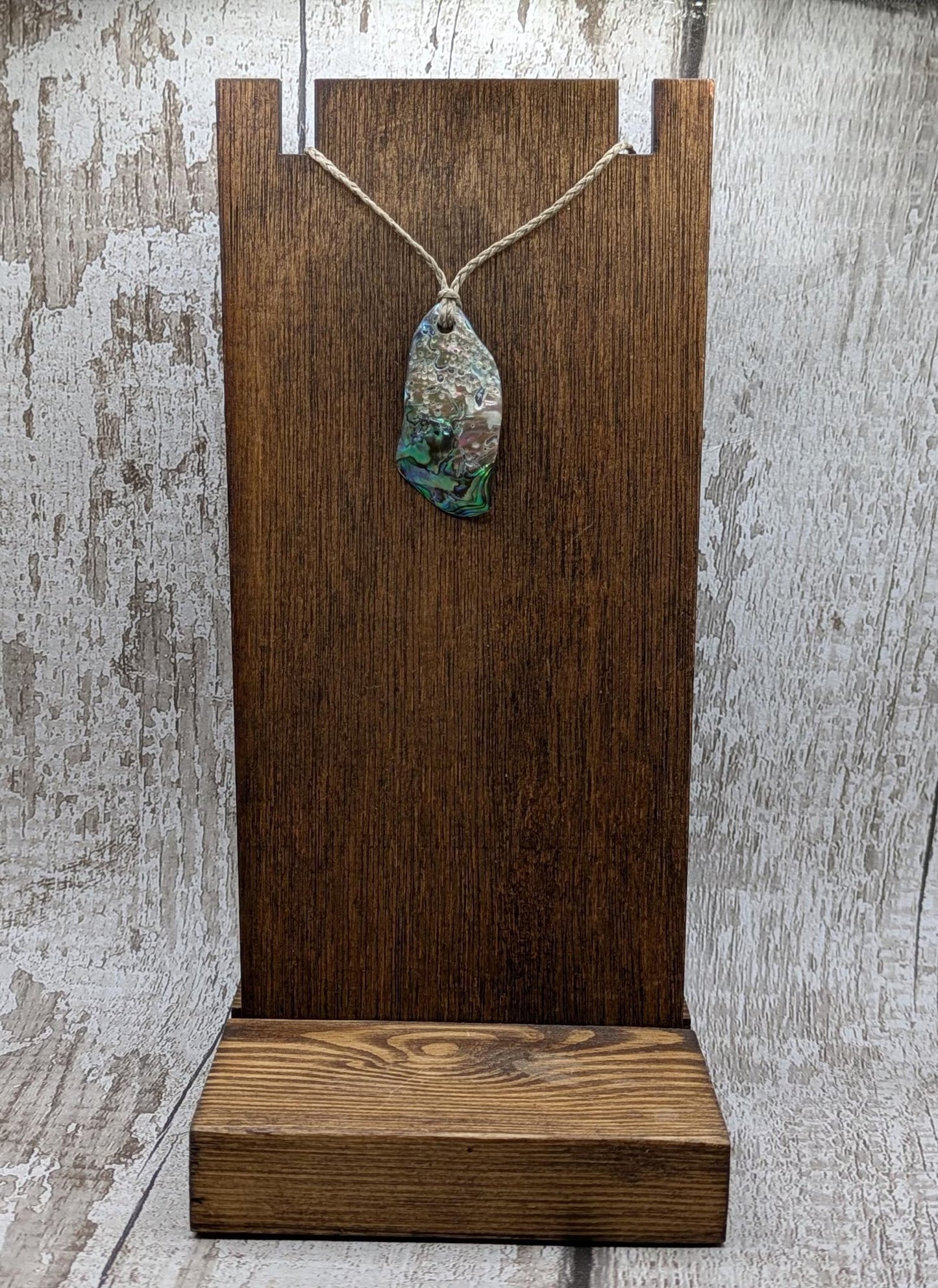 New Zealand free form wild tumbled rainbow Pāua pendant.