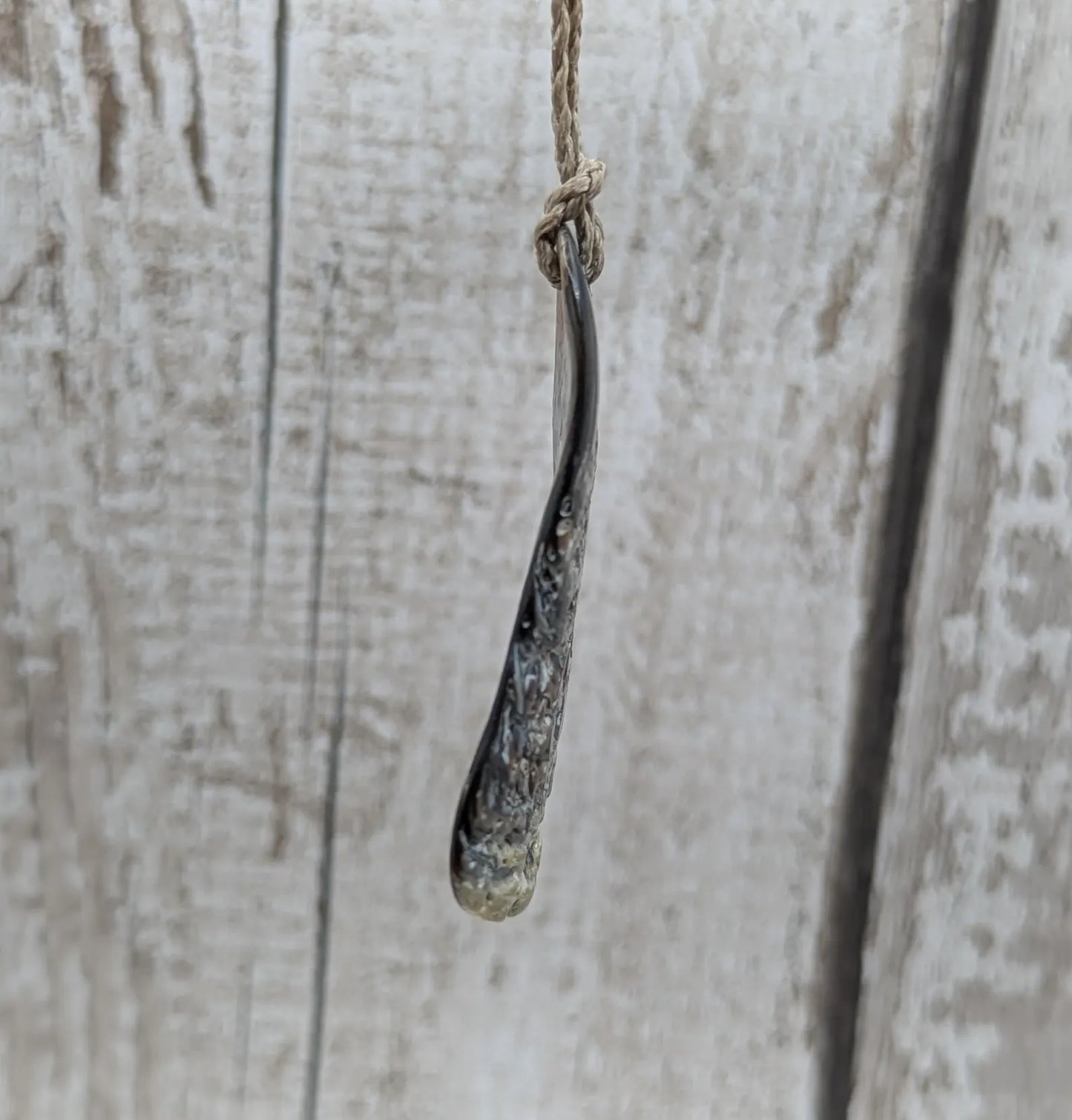 New Zealand free form naturally tumbled Pāua shell pendant.