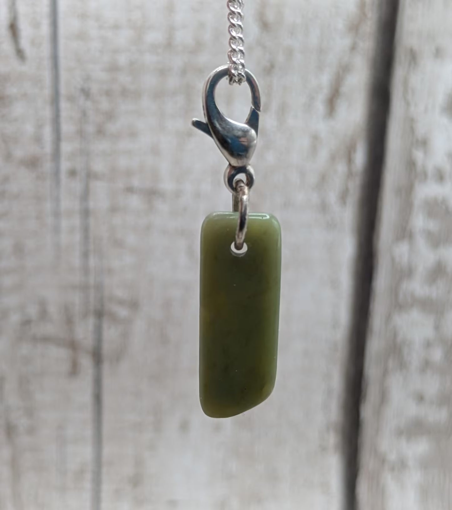 Tumbled New Zealand Pounamu greenstone jade clip on jewellery charm.