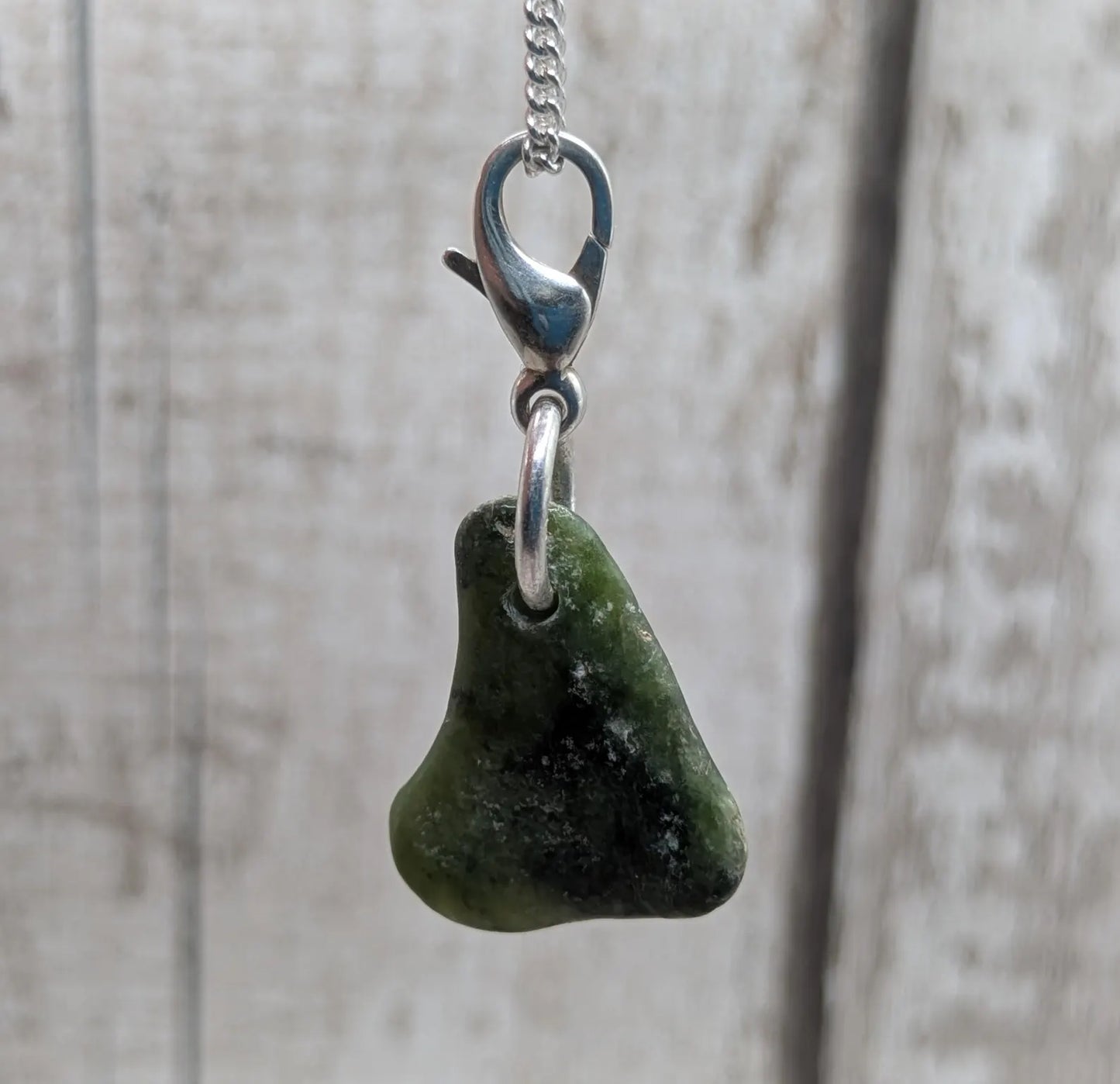 Tumbled New Zealand Pounamu greenstone jade clip on charm.