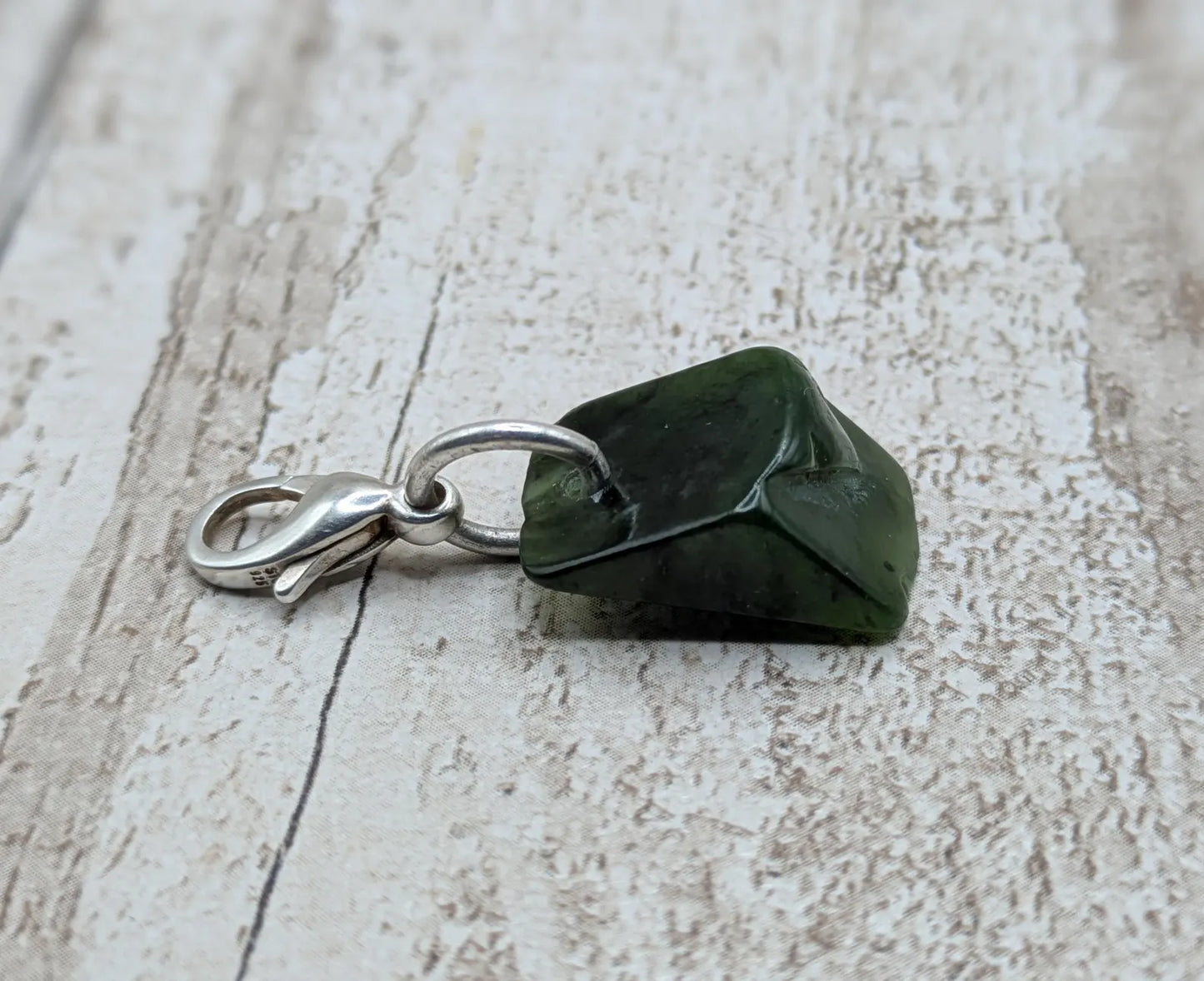 Tumbled New Zealand Pounamu greenstone jade clip on jewellery charm.