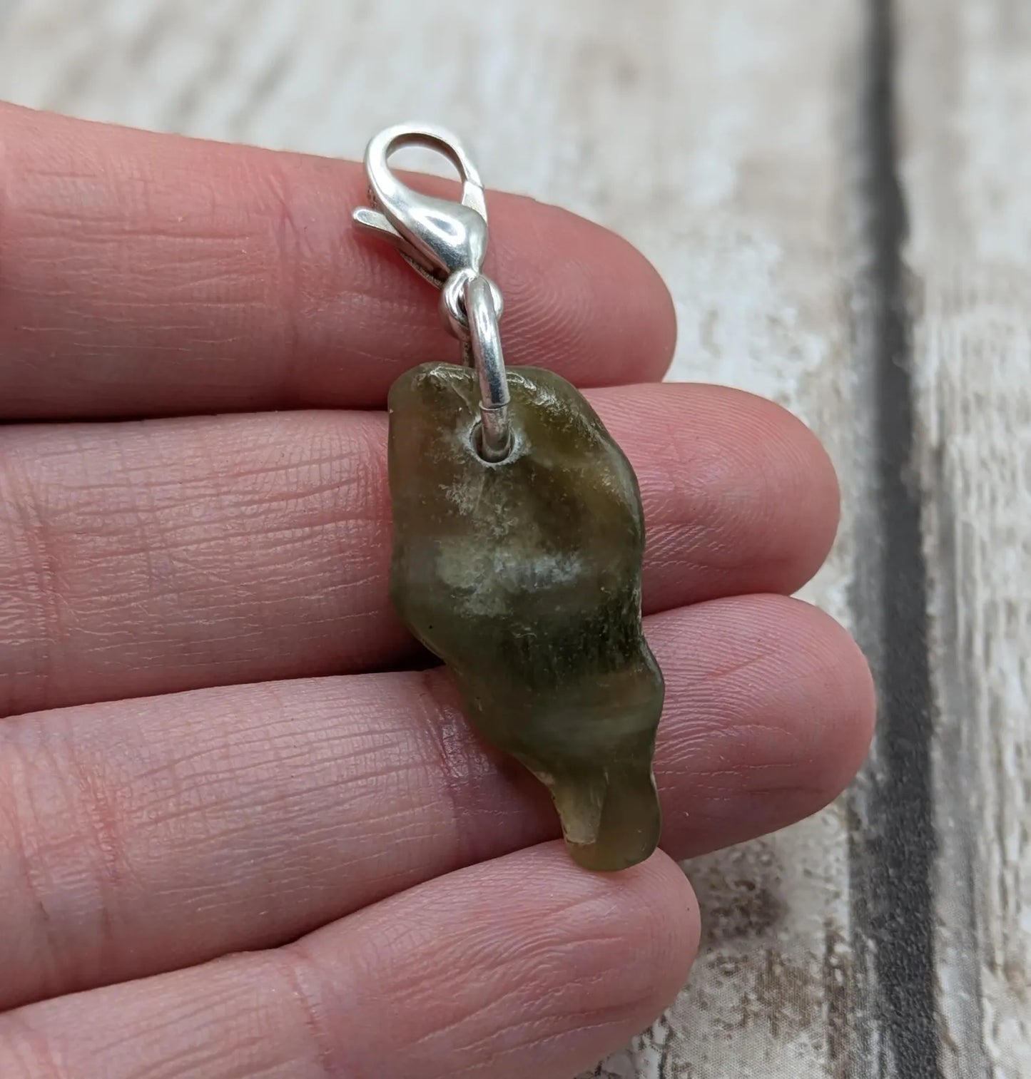 Tumbled New Zealand Pounamu greenstone jade clip on jewellery charm.