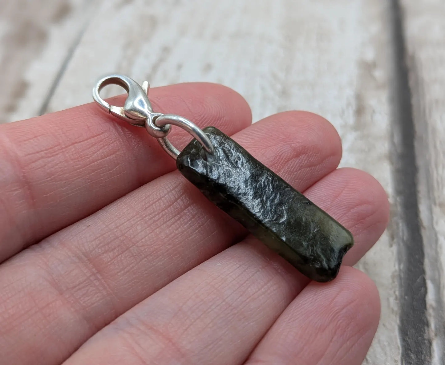 Tumbled New Zealand Pounamu greenstone jade clip on jewellery charm.
