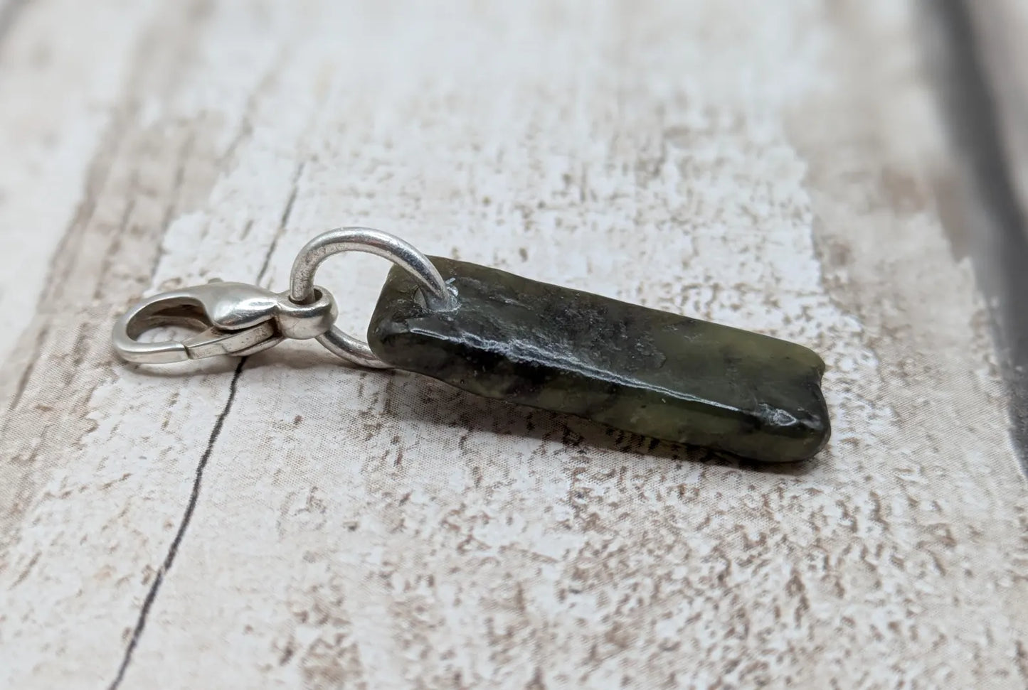 Tumbled New Zealand Pounamu greenstone jade clip on jewellery charm.