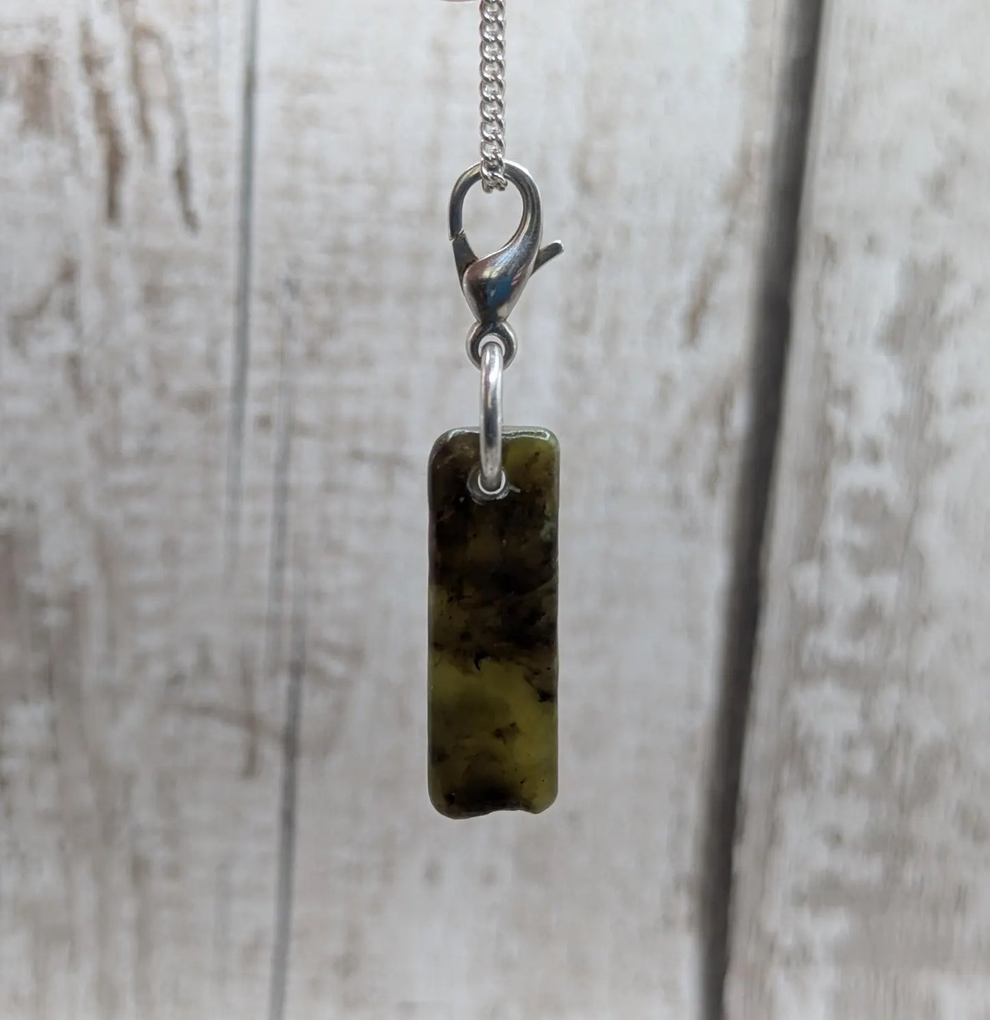 Tumbled New Zealand Pounamu greenstone jade clip on jewellery charm.