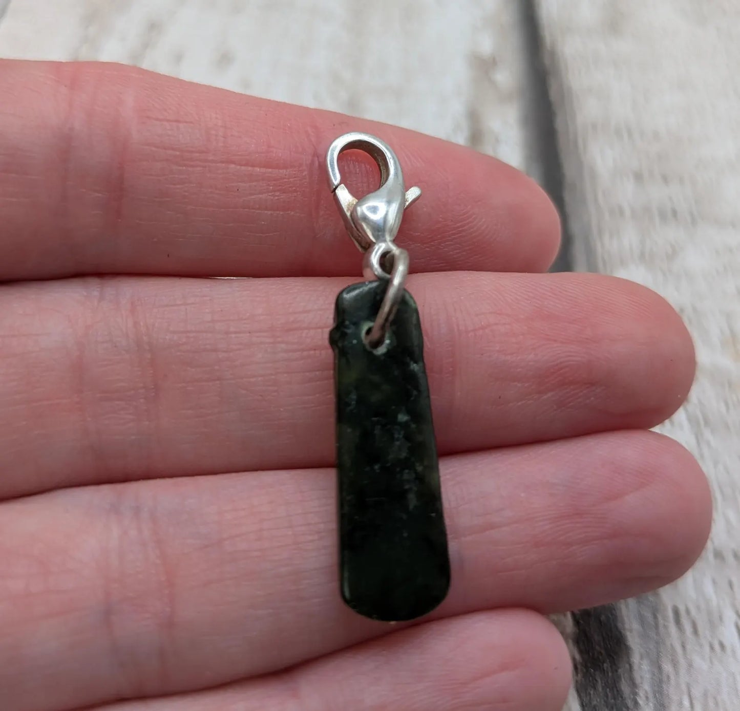 Tumbled New Zealand Pounamu jade clip on jewellery charm.