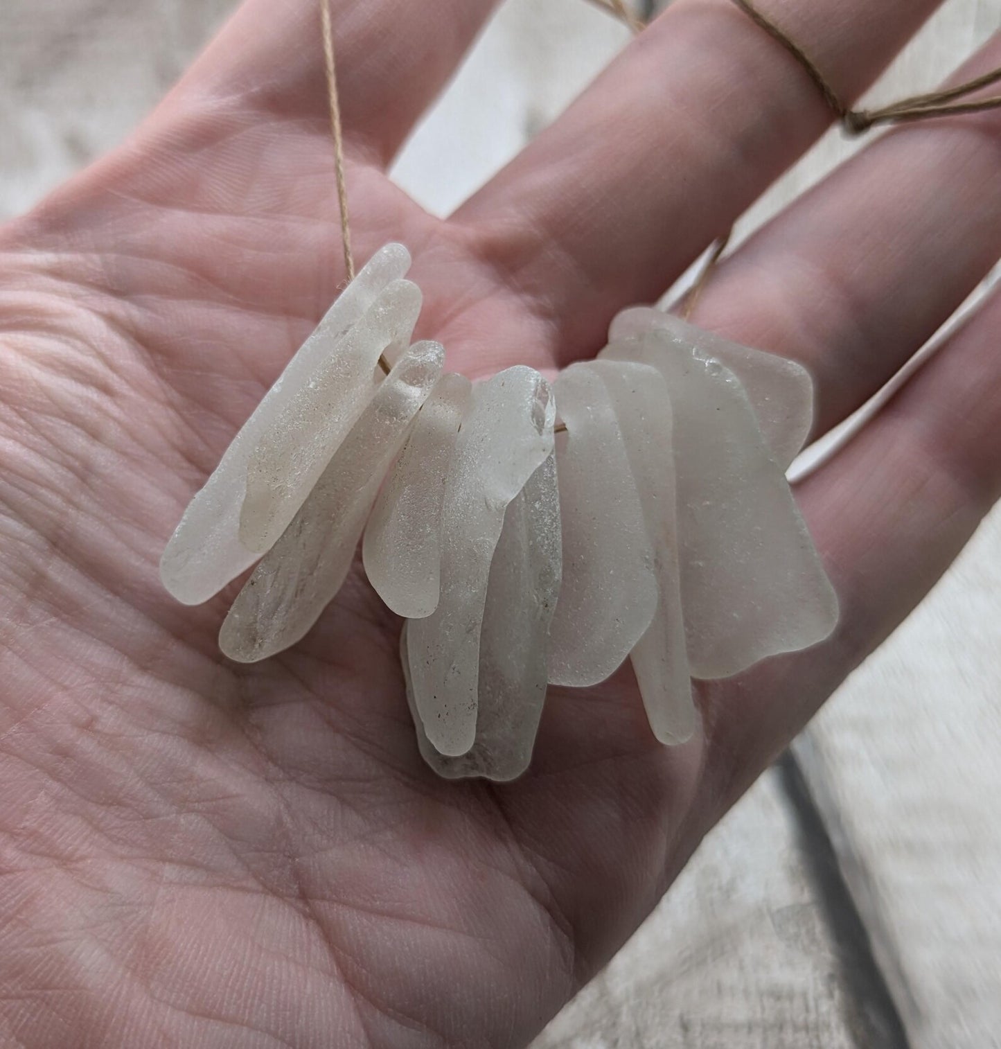 20 small Hand-Drilled Sea Glass Beads.