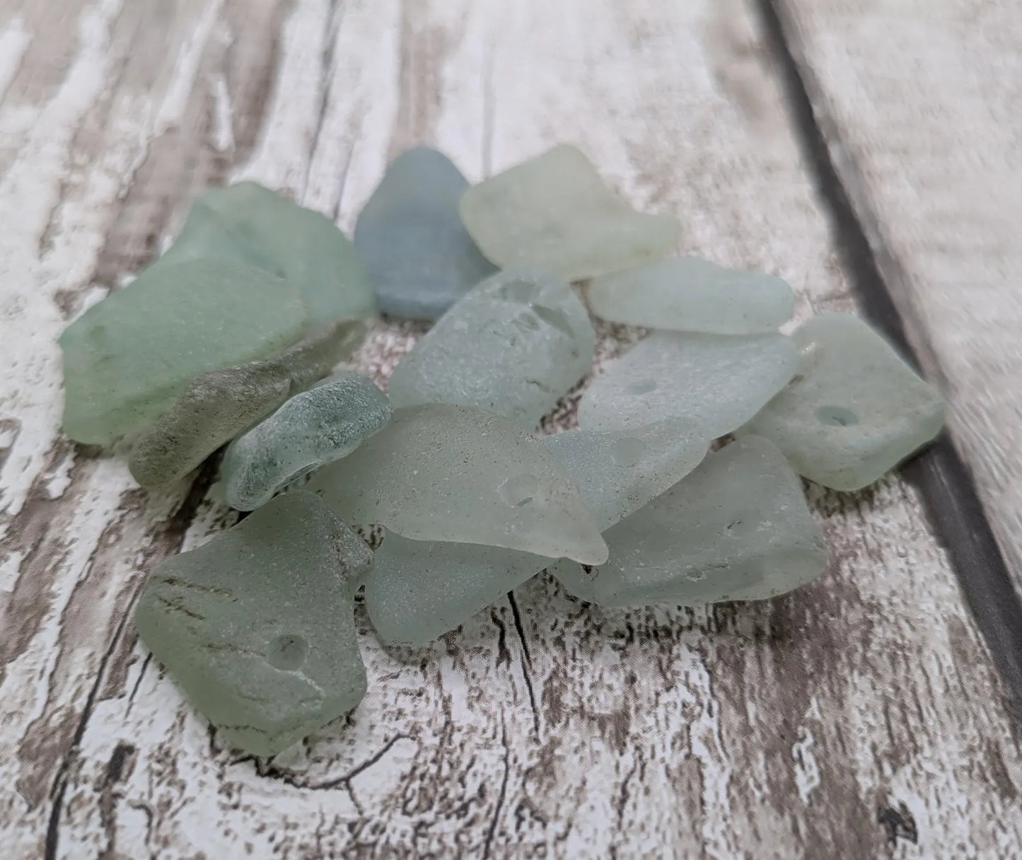 20 small Teal Sea Glass Hand Drilled Beads.