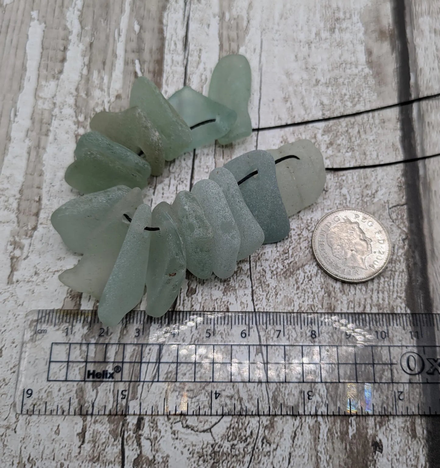 20 small Teal Sea Glass Hand Drilled Beads.