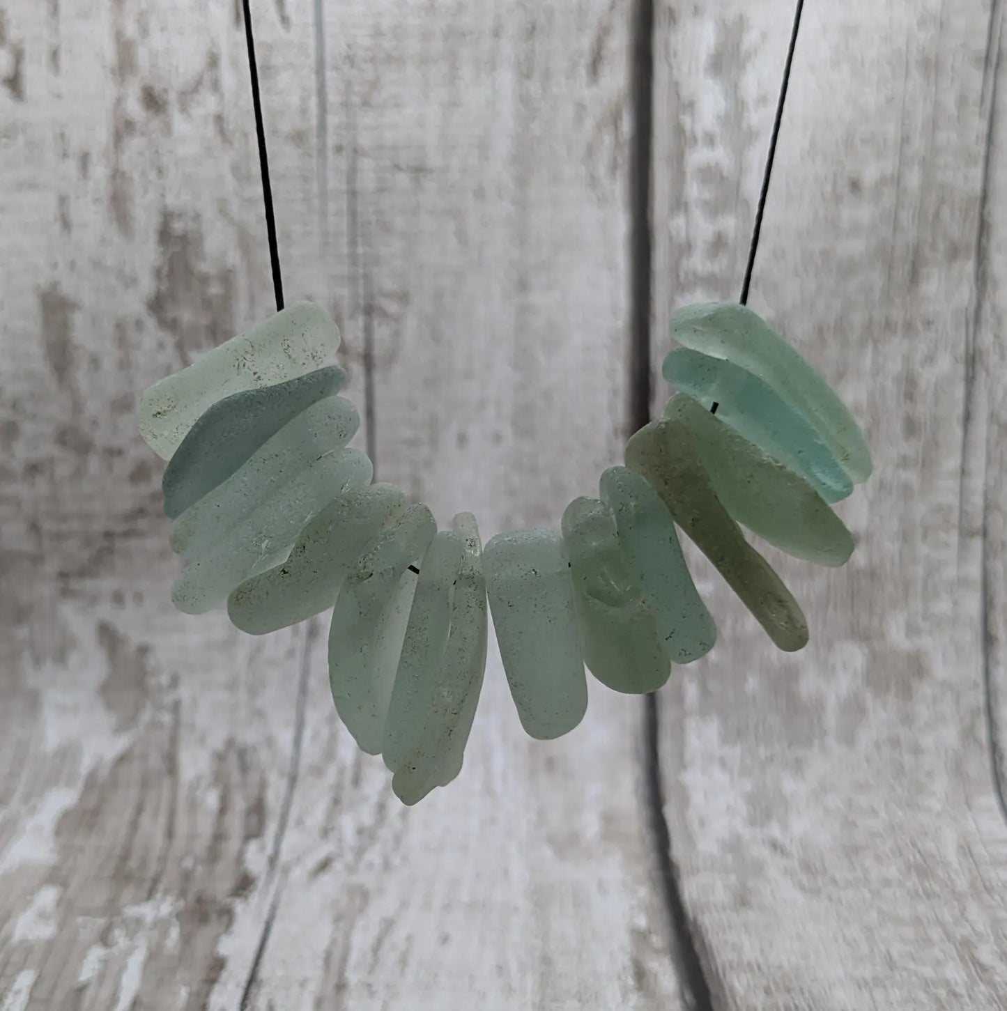 20 small Teal Sea Glass Hand Drilled Beads.