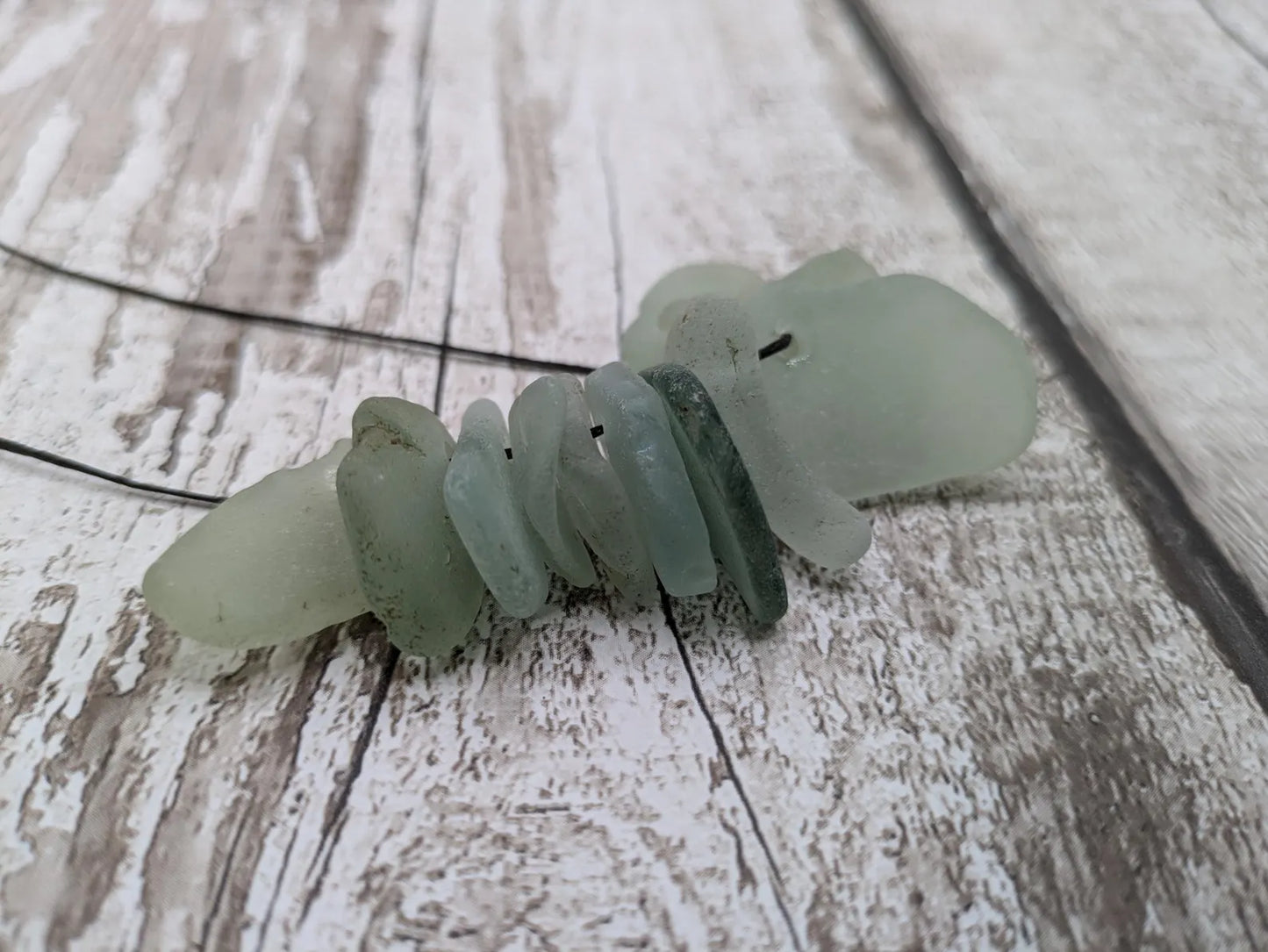 20 small Teal Sea Glass Hand Drilled Beads.