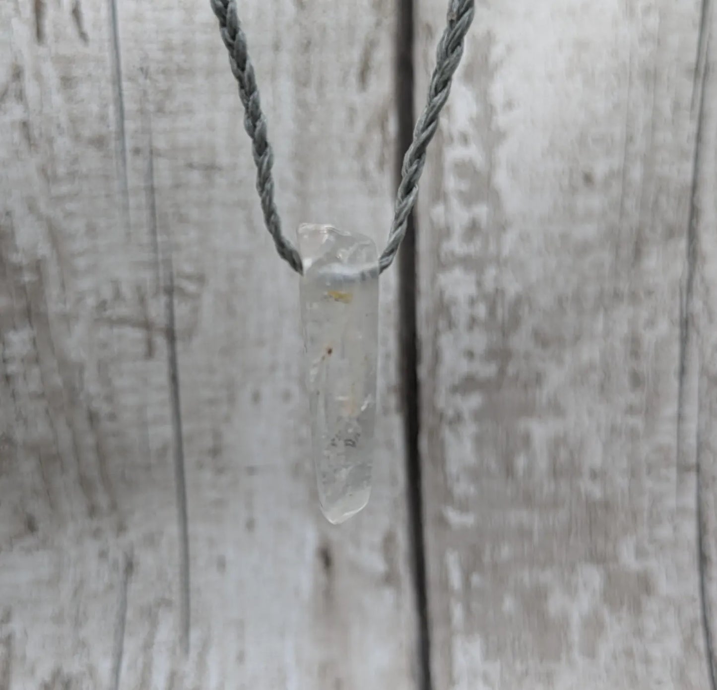 Tibetan clear quartz Crystal point pendant.