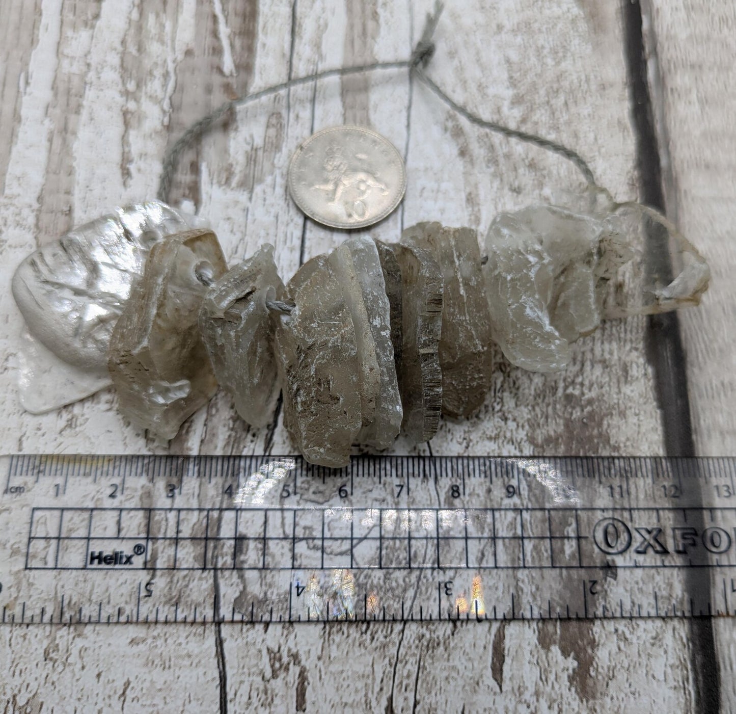 Top drilled sheppy selenite beads.