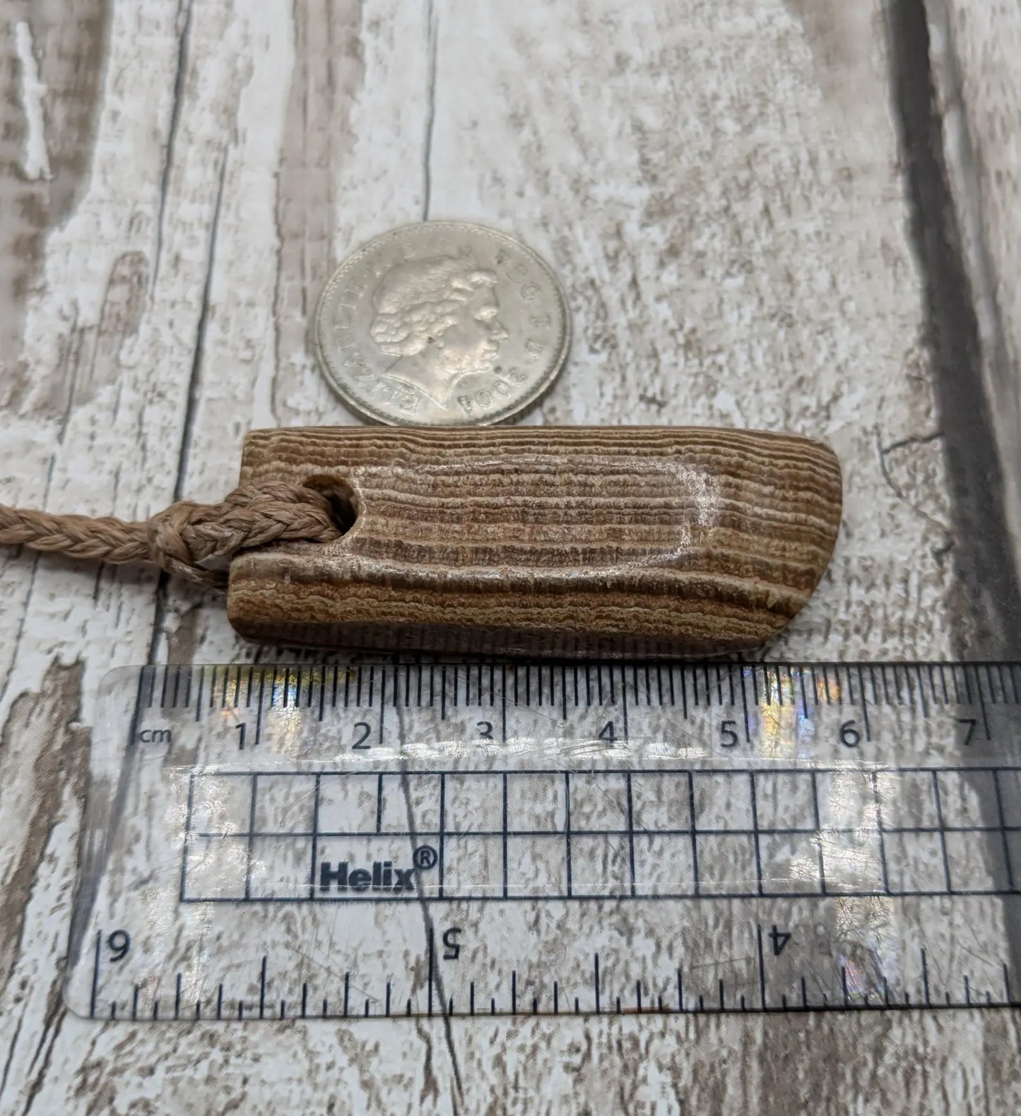 Striped argonite Toki styled pendant.