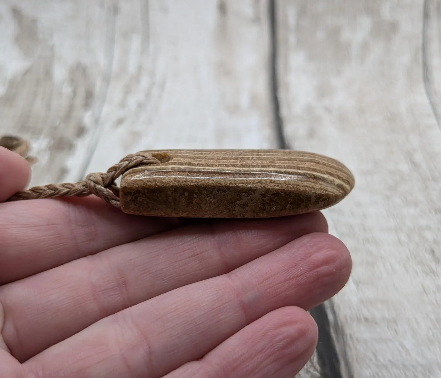 Striped argonite Toki styled pendant.